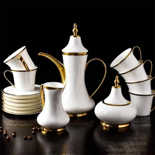 Tea Cup Set - European Style, Coffee Pot, Cup Saucer, and Spoon.